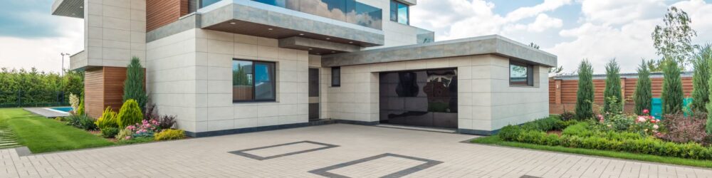 concrete driveway cost sqm New Zealand